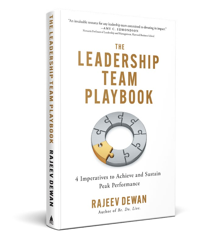 The Leadership Team Playbook by Rajeev Dewan — white and gold hardcover with a circular puzzle on the cover